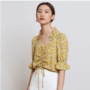 Yellow and white floral ruffle crop top with ruffle detail Size S